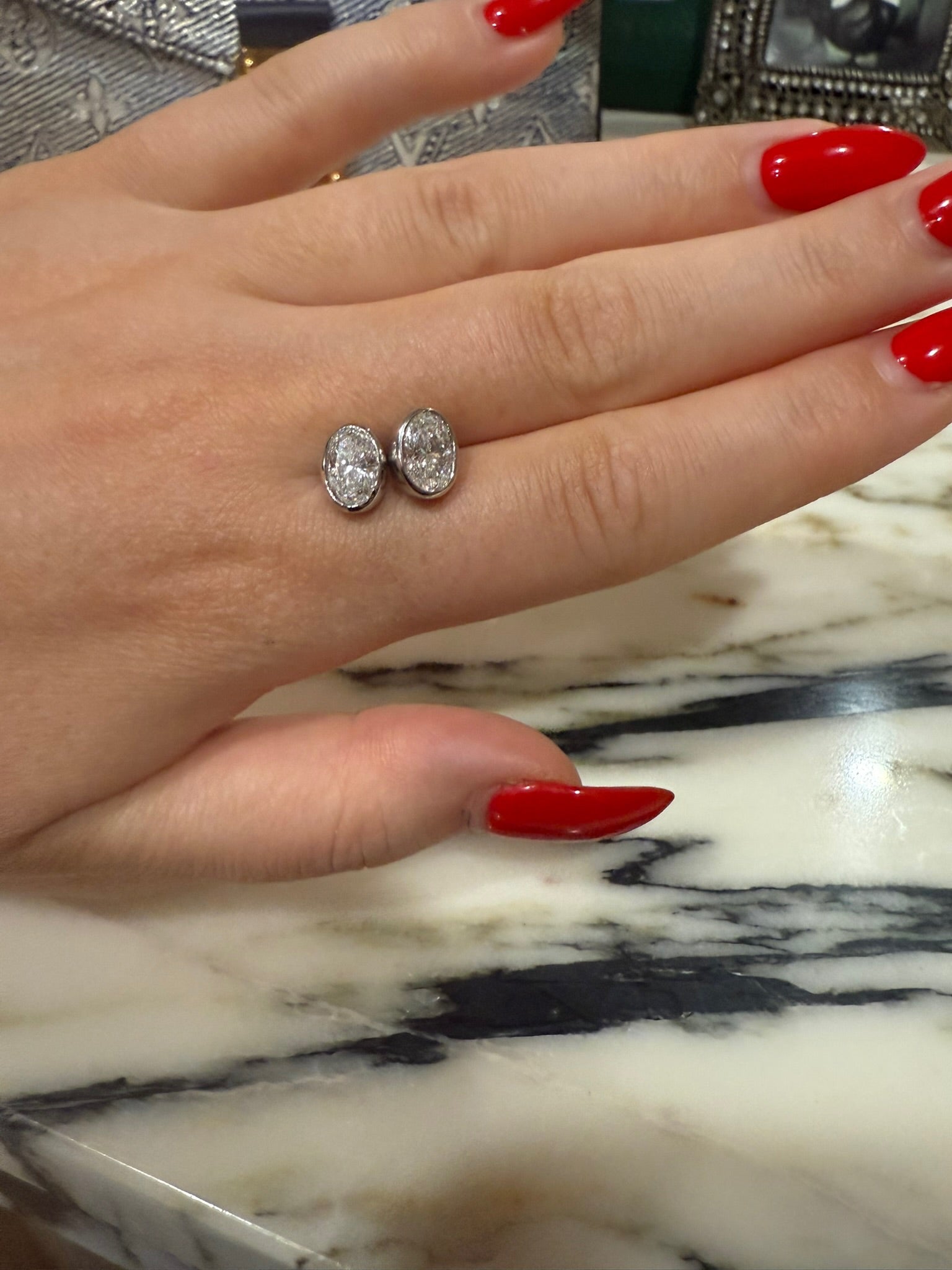 Bina Bezel Studs close-up on ear — 2 ctw bezel lab diamonds, white gold — ELUL by Elizabeth