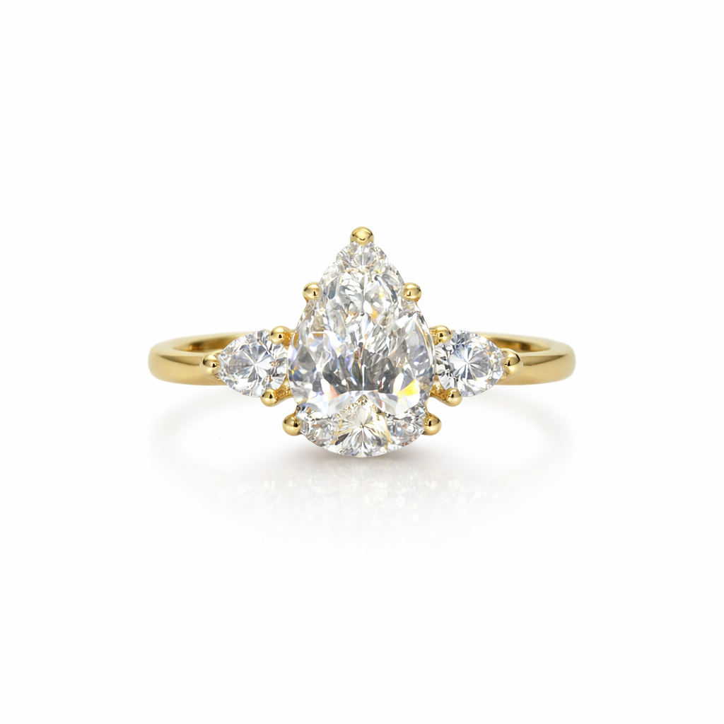 Ness pear three-stone engagement ring in yellow gold, IGI certified lab diamond — ELUL by Elizabeth