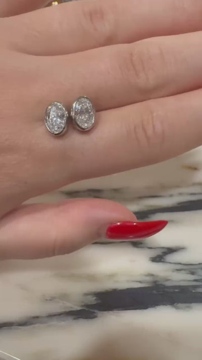 Bina Bezel Studs in motion — bezel-set lab-grown diamond studs, white gold — ELUL by Elizabeth
