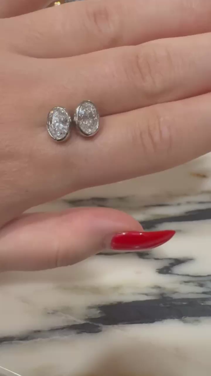 Bina Bezel Studs in motion — bezel-set lab-grown diamond studs, white gold — ELUL by Elizabeth