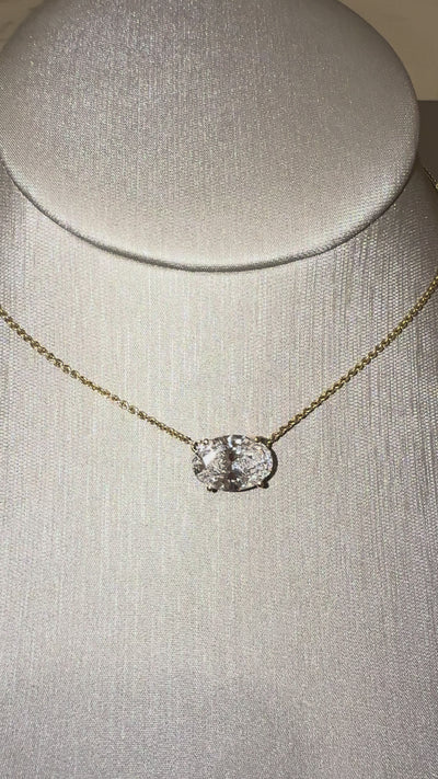 Muse Oval Necklace in motion — 5 ct IGI oval lab-grown diamond pendant, yellow gold — ELUL by Elizabeth