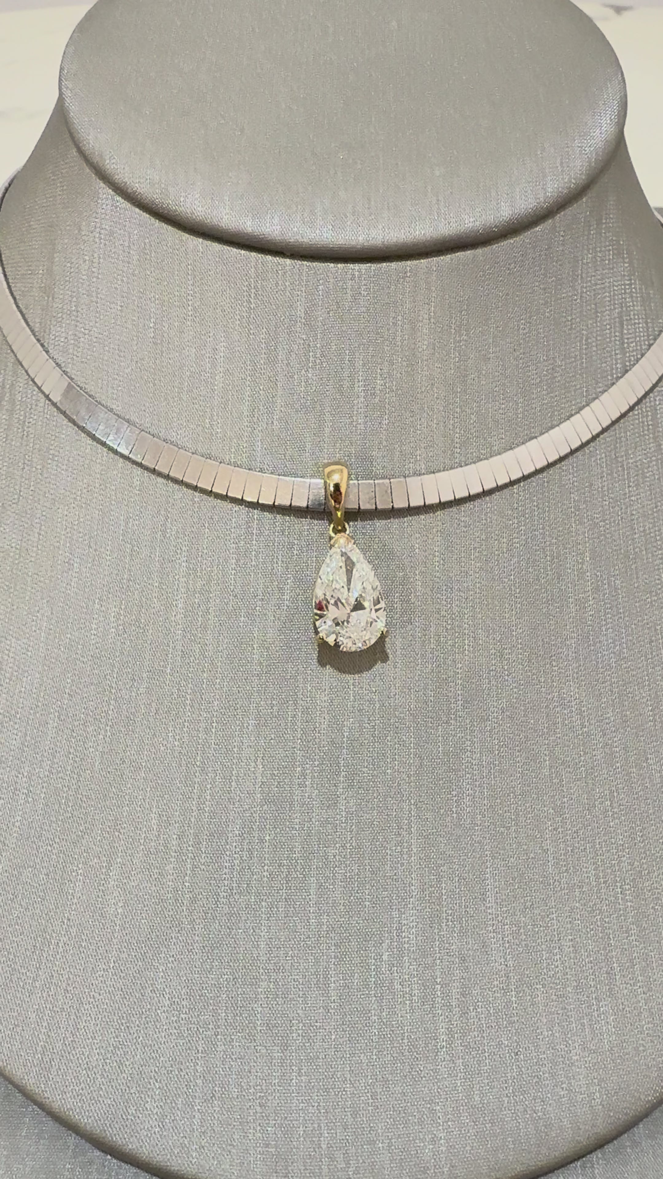 Noor Pendant Omega Necklace in motion — pear diamond pendant, white gold omega chain — ELUL by Elizabeth