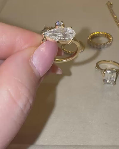 Emunah Pear Pinky Ring in motion — pear-shaped lab diamond cluster, yellow gold — ELUL by Elizabeth