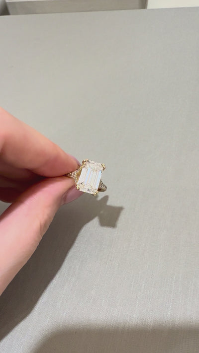 Ness Emerald Yellow Gold Solitaire Ring close-up — emerald-cut lab diamond, E color VS1 clarity — ELUL by Elizabeth