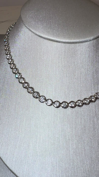 Bina Bezel Tennis Necklace worn on neck — 10 ctw bezel-set lab diamonds, white gold — ELUL by Elizabeth