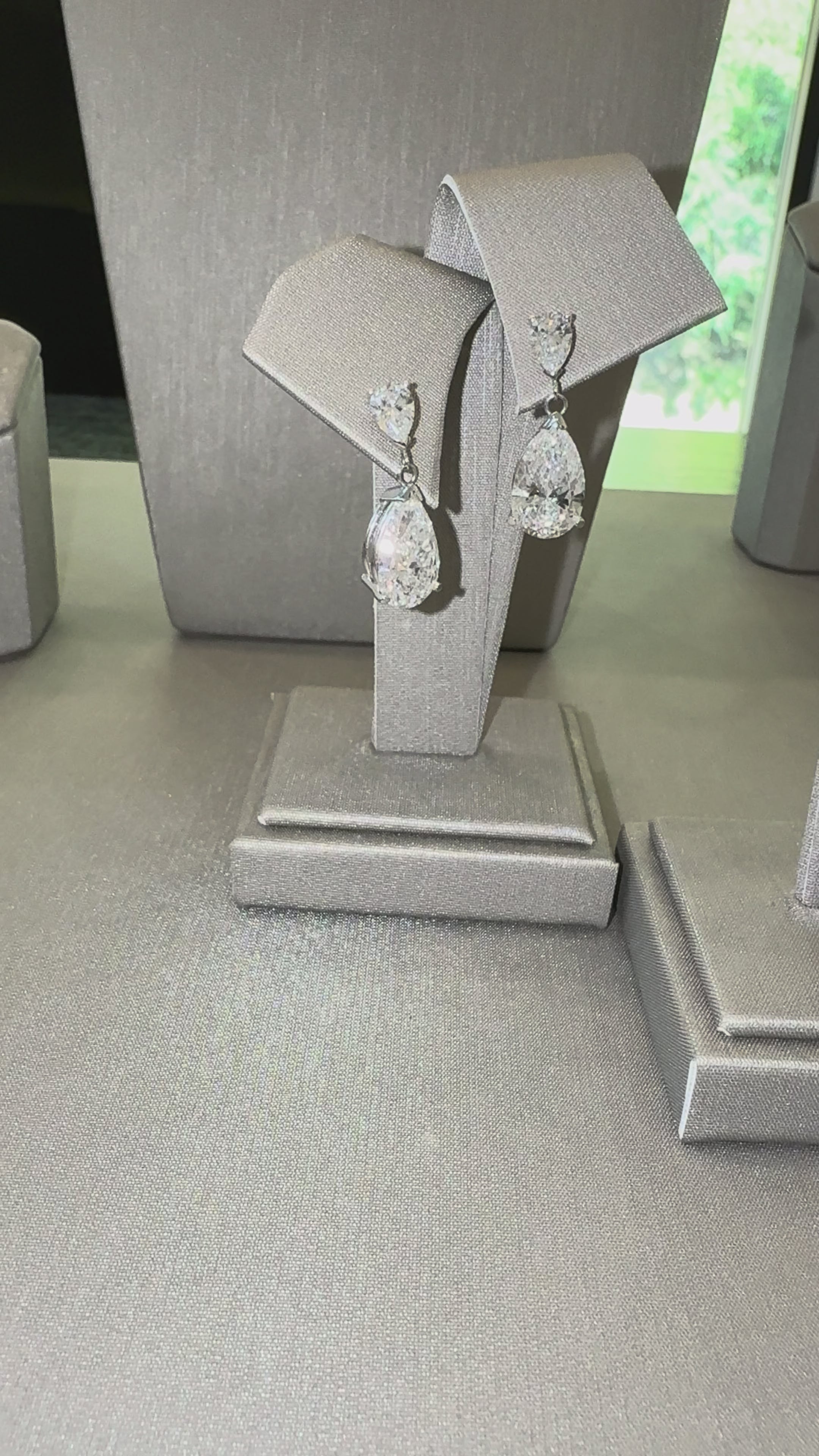 Jules Pear Drop Earrings in motion — pear-shaped lab-grown diamonds, ~7 ctw — ELUL by Elizabeth