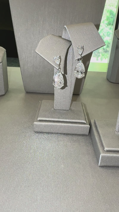 Jules Pear Drop Earrings in motion — pear-shaped lab-grown diamonds, ~7 ctw — ELUL by Elizabeth