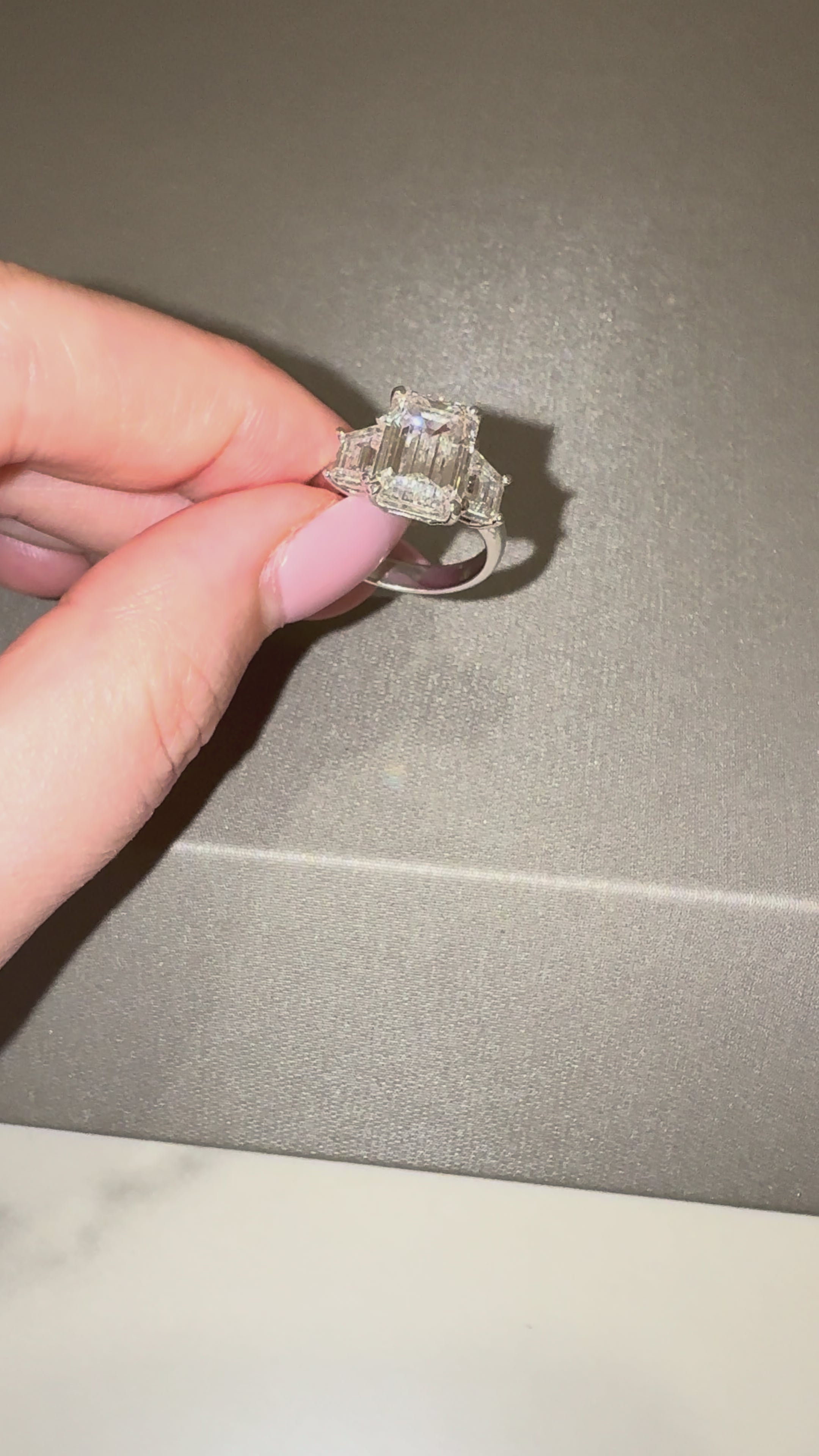 Ness Emerald 3 Stone Engagement Ring close-up — emerald-cut lab diamond with half-moon sides, white gold — ELUL by Elizabeth